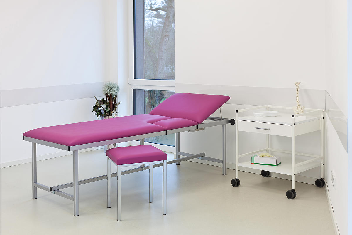 Table d'échocardiographie avec revêtement en cuir synthétique VOWAled Pisa en couleur de rembourrage magenta